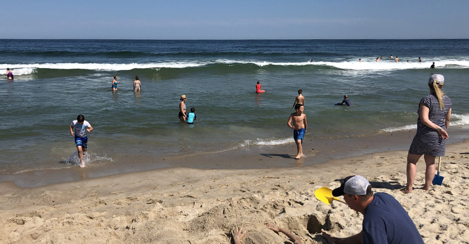 Enjoying the sand and surf at Nauset Beach in Orleans, MA.