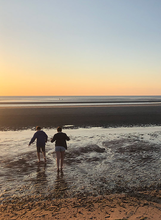 A gorgeous sunset at Crosby Beach in Brewster, MA during low tide.